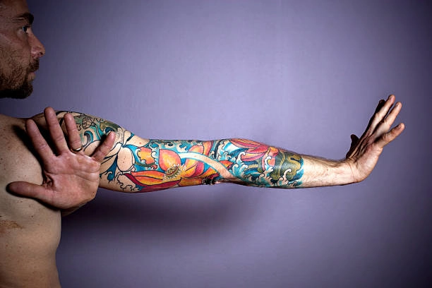 How Skin Changes Can Affect Full Sleeve Tattoos in Santa Fe, NM